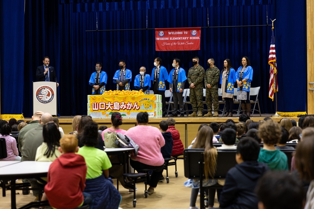 Harvesting Relationships: Marine Corps Air Station Iwakuni and Yamaguchi Prefectural personnel participate in Mikan rresentation at Iwakuni Intermediate School