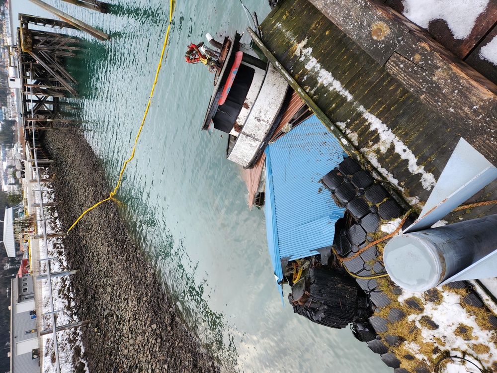 Coast Guard Sector Juneau, contractors respond to partially-submerged tug in Juneau, Alaska