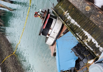 Coast Guard Sector Juneau, contractors respond to partially-submerged tug in Juneau, Alaska