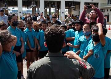 Cope North exercise participants &quot;Pet the Jet&quot; event with Guam elementary students
