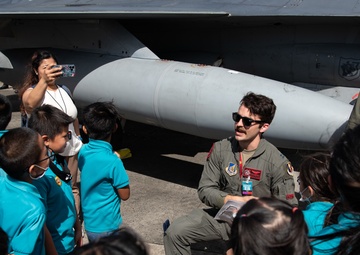 Cope North exercise participants &quot;Pet the Jet&quot; event with Guam elementary students