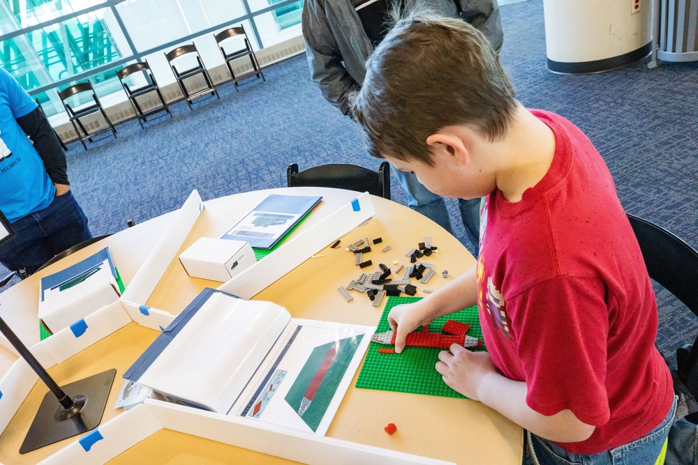 Visitors build LEGO ship models during Naval Museum's 12th Annual Brick by Brick: LEGO Shipbuilding event