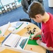 Visitors build LEGO ship models during Naval Museum's 12th Annual Brick by Brick: LEGO Shipbuilding event