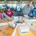 Visitors build LEGO ship models during Naval Museum's 12th Annual Brick by Brick: LEGO Shipbuilding event