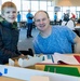 Visitors build LEGO ship models during Naval Museum's 12th Annual Brick by Brick: LEGO Shipbuilding event