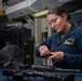 Sailor Performs A Safety Check On M4 Rifle