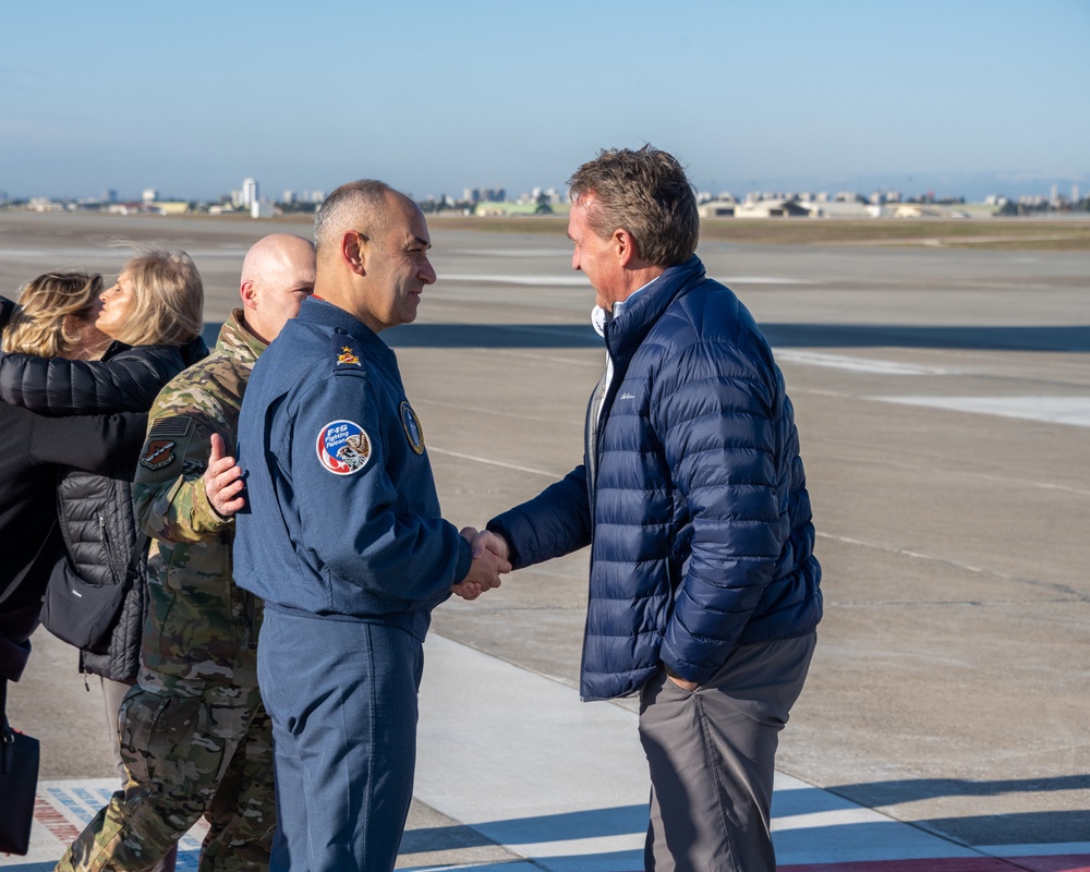 U.S. Ambassador Jeffry Flake greets USAID volunteers arriving to Incirlik AB