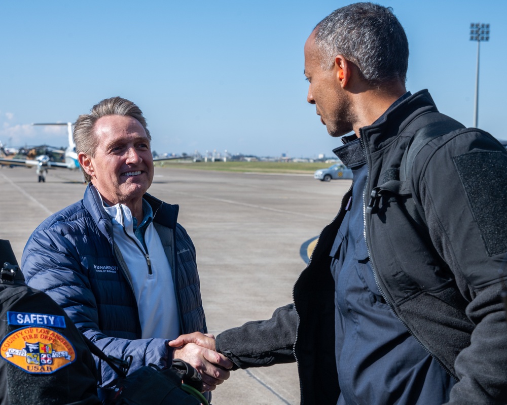 U.S. Ambassador Jeffry Flake greets USAID volunteers arriving to Incirlik AB