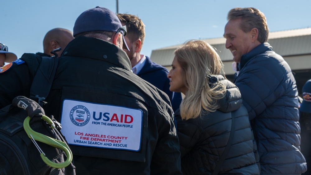 U.S. Ambassador Jeffry Flake greets USAID volunteers arriving to Incirlik AB
