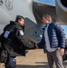 U.S. Ambassador Jeffry Flake greets USAID volunteers arriving to Incirlik AB