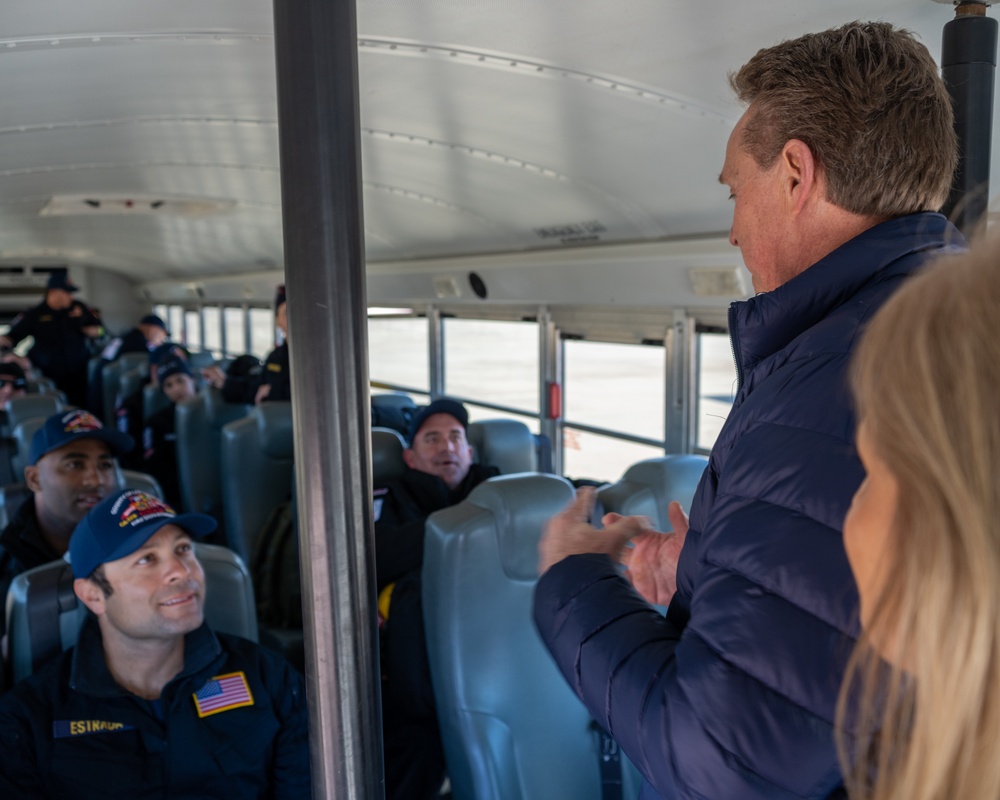 U.S. Ambassador Jeffry Flake greets USAID volunteers arriving to Incirlik AB