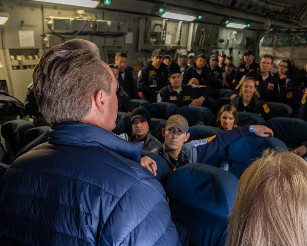 U.S. Ambassador Jeffry Flake greets USAID volunteers arriving to Incirlik AB