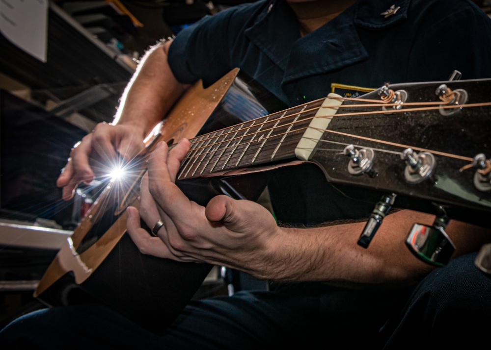 Sailor Practices Guitar