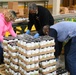 Members of CNIC Women’s Employee Resource Group (ERG) volunteer at the Capital Area Food Bank in Washington, D.C.