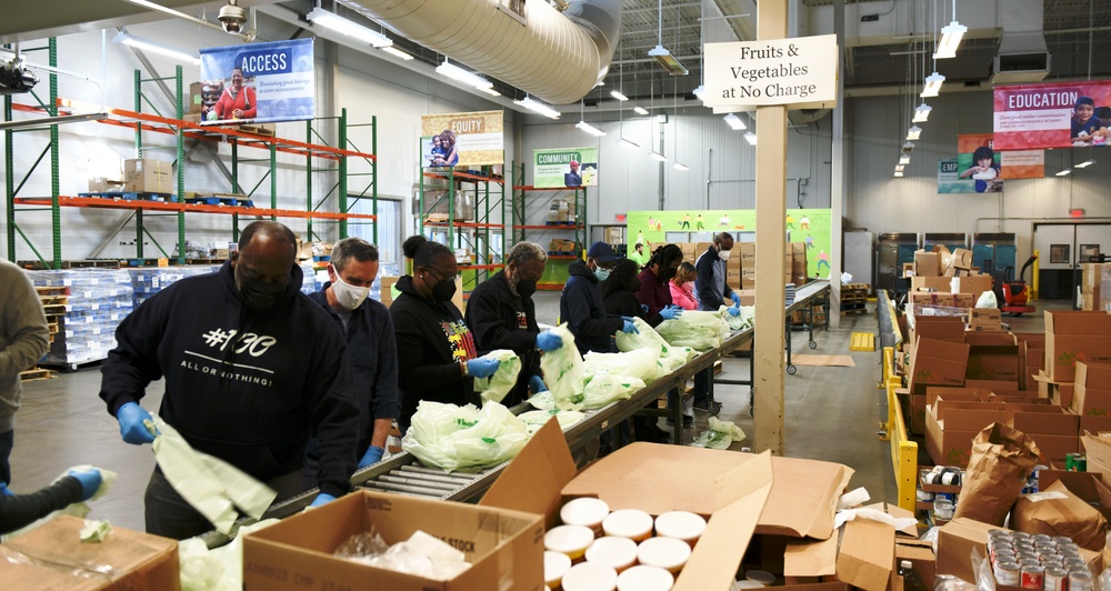 Members of CNIC Women’s Employee Resource Group (ERG) volunteer at the Capital Area Food Bank