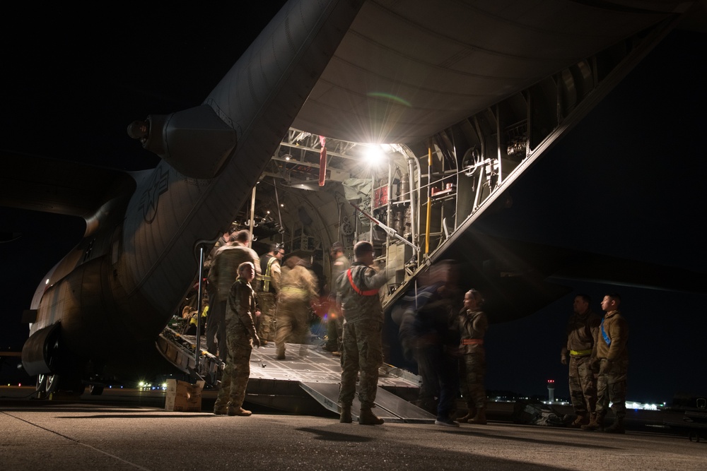 302nd Airlift Wing Medical Technicians Offload C-130