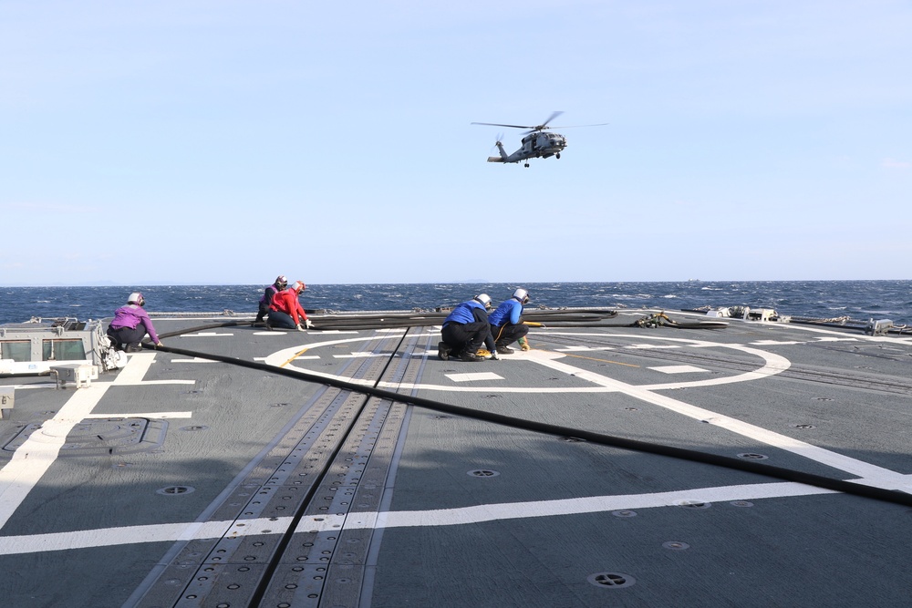 USS Howard (DDG 83) Conducts Helicopter In-Flight Refueling