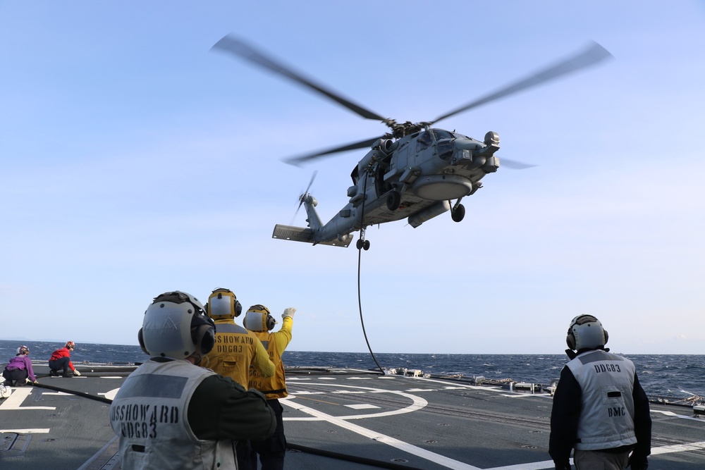 USS Howard (DDG 83) Conducts Helicopter In-Flight Refueling