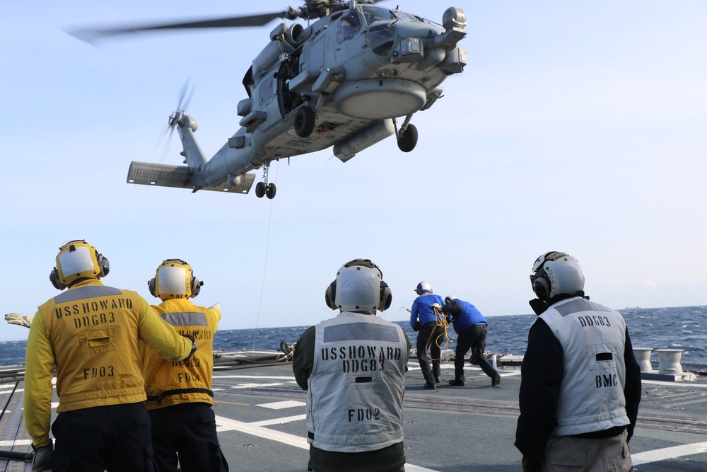 USS Howard (DDG 83) Conducts Helicopter In-Flight Refueling