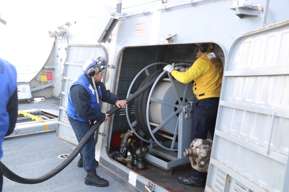 USS Howard (DDG 83) Conducts Helicopter In-Flight Refueling