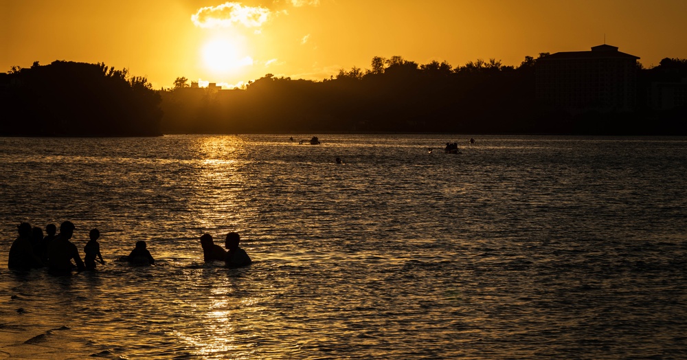 Residents and travelers visit the beaches of Guam