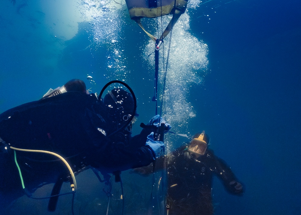 U.S. Navy Divers Conduct Ice Diving