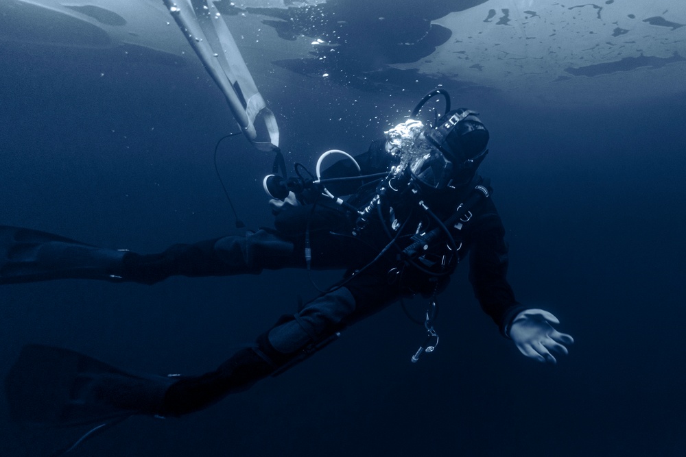 U.S. Navy Divers Conduct Ice Diving