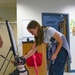 A YES Program Participants Meets Macy, a Brown Tree Snake Detection Dog