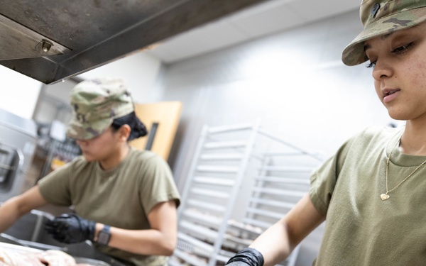 The 905th QM PLT Preparing Meals