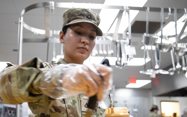 The 905th QM PLT Preparing Meals