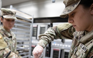 The 905th QM PLT Preparing Meals