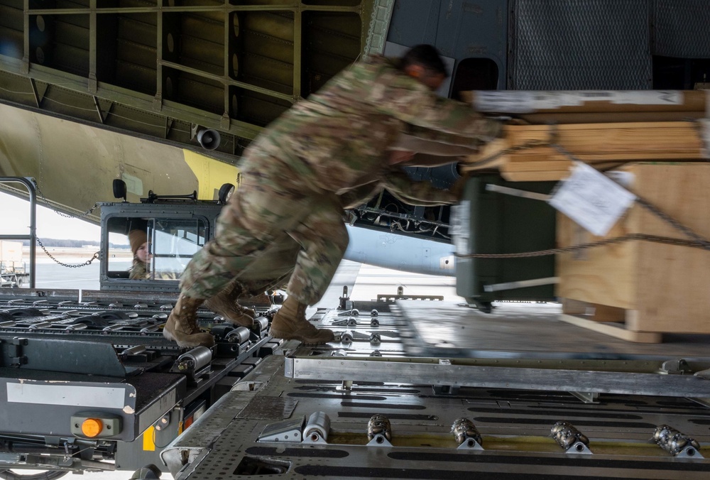 436th APS Airmen move the mission