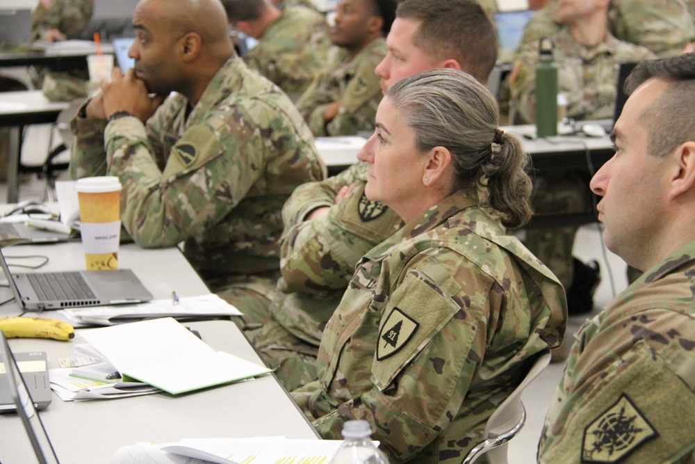 91st TD Soldiers listen during a lecture