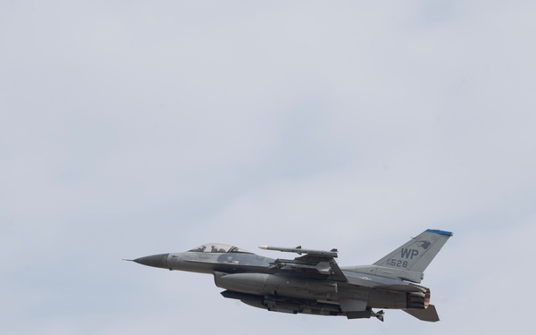F-16, KF-16 Fighting Falcons soar over Kunsan Air Base