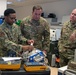 52nd FW command team “rolls up sleeves,” visits MDG