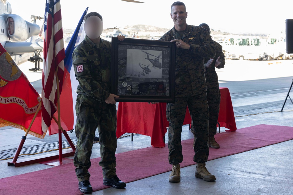 Czech Air Force Pilots and Crew Chiefs Graduate Light Attack Helicopter Training in San Diego