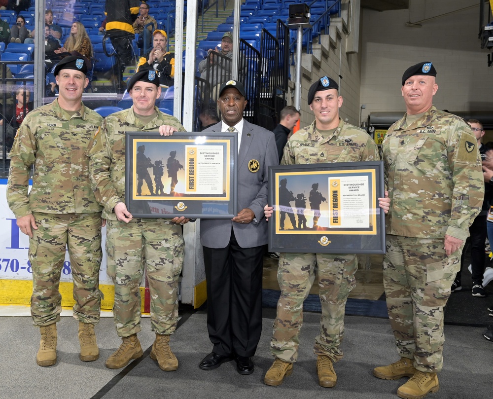 Team Tobyhanna presents two servicemembers with Warfighter of the Quarter awards