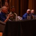 Luke holds Medal of Honor panel