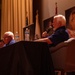 Luke holds Medal of Honor panel