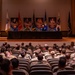 Luke holds Medal of Honor panel