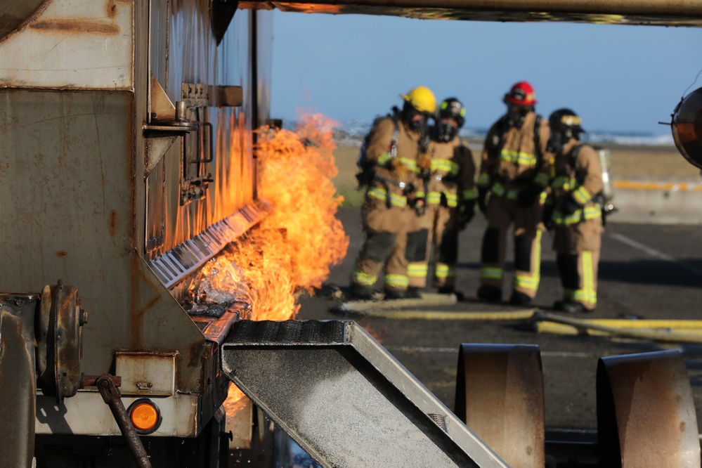 Hawaii Army National Guard, Air Force Reserve and Marine Corps Firefighters conduct a joint training exercise at Kaneohe Marine Air Station.