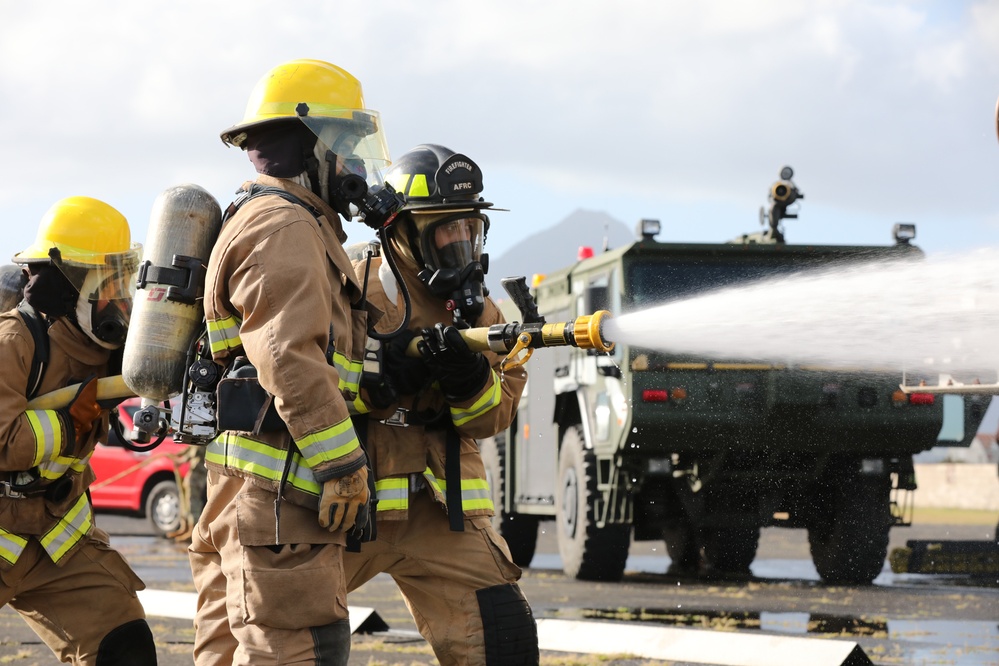 Hawaii Army National Guard, Air Force Reserve and Marine Corps Firefighters conduct a joint training exercise at Kaneohe Marine Air Station.