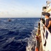 USCGC Myrtle Hazard crew transfers two mariners rescued from the water