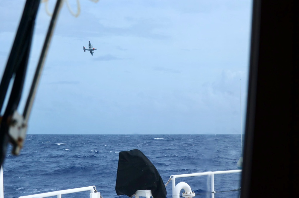 U.S. Coast Guard HC-130 crew searches for missing mariner off Guam