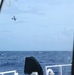 U.S. Coast Guard HC-130 crew searches for missing mariner off Guam