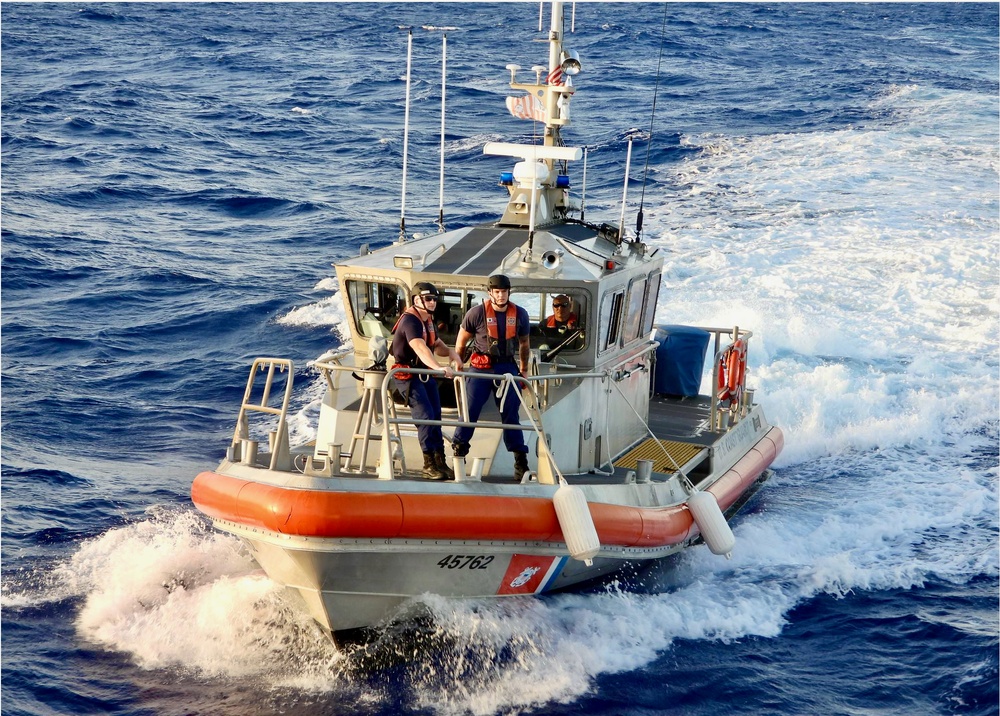 USCGC Myrtle Hazard crew transfers survivors to Station Apra Harbor