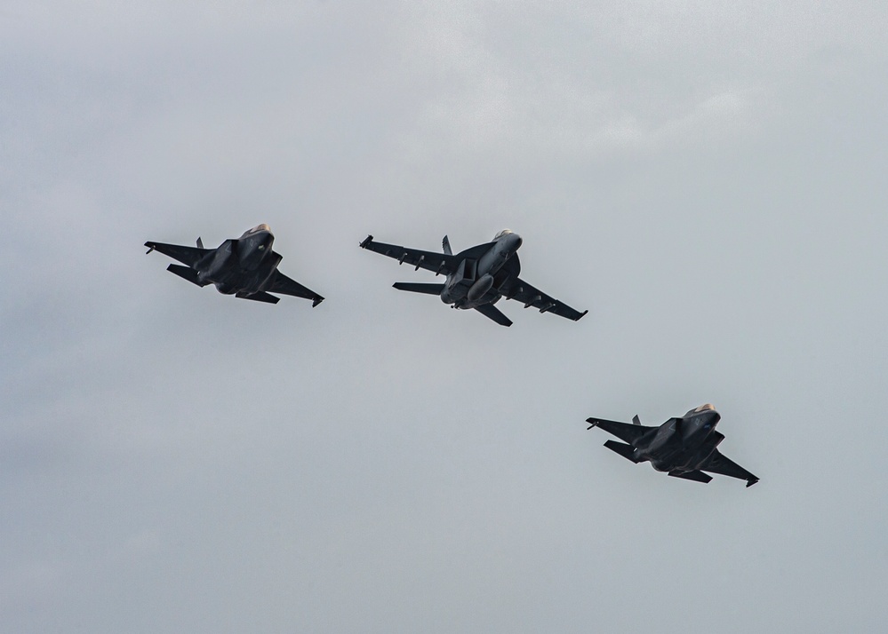 U.S. Navy Aircraft Conduct Flyby