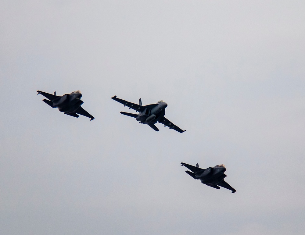 U.S. Navy Aircraft Conduct Flyby