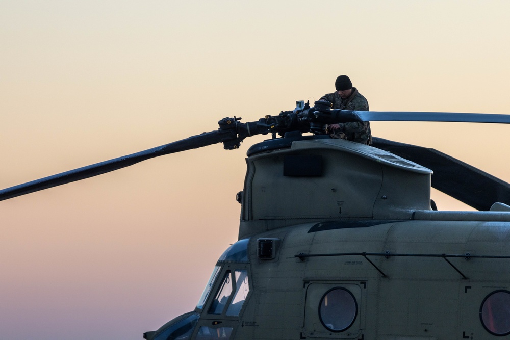 U.S. Army Soldier Prepares CH-47 Chinook for Humanitarian and Disaster Relief