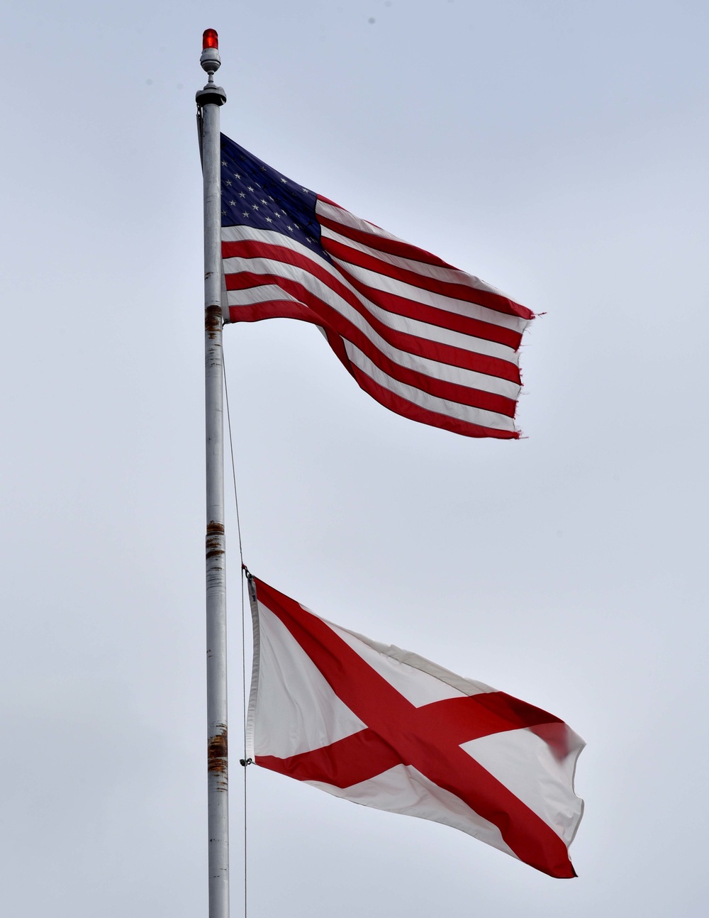 US flag and Alabama State flag